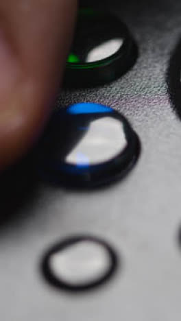 Vertical-Video-Close-Up-Studio-Hands-Playing-Video-Game-Controller-Buttons-Joystick